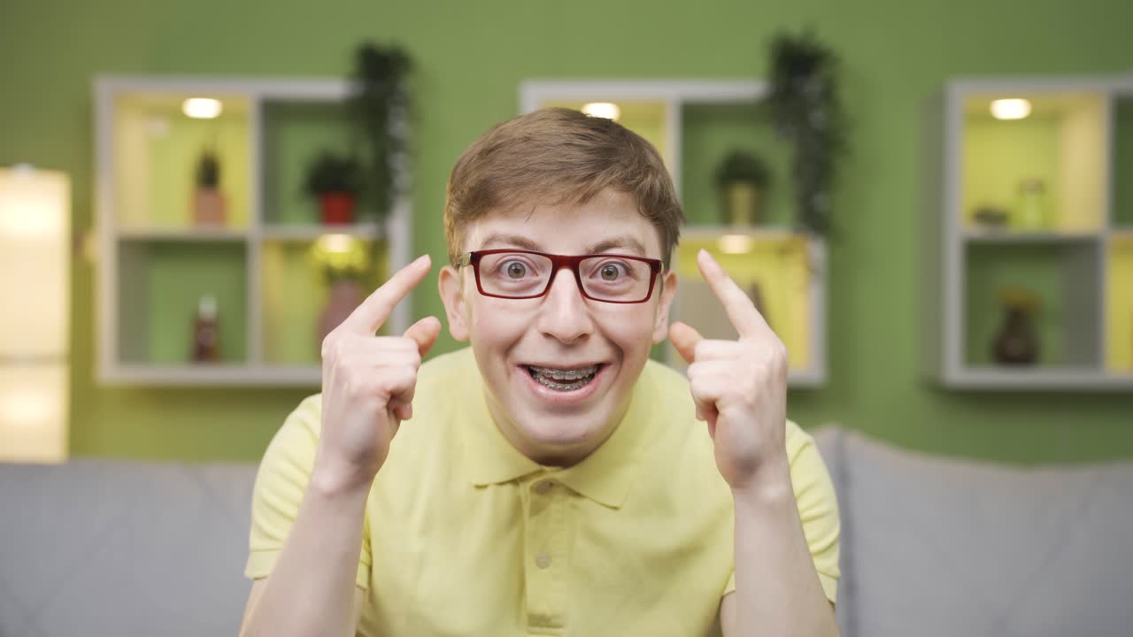 Close-up portrait of smart and intelligent young man.