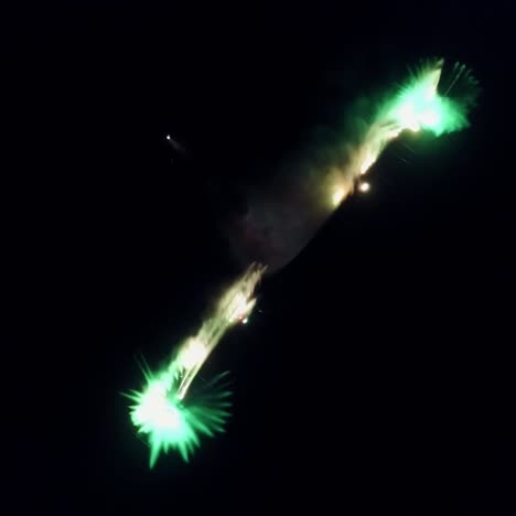 water music fountain in night. aerial shot of the dancing colorful fountain with reflection on water at night