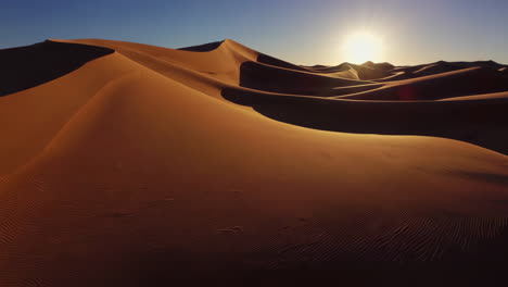 golden sunset over majestic desert dunes