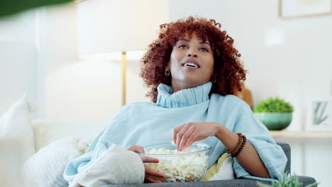 happy, excited and young woman watching a movie