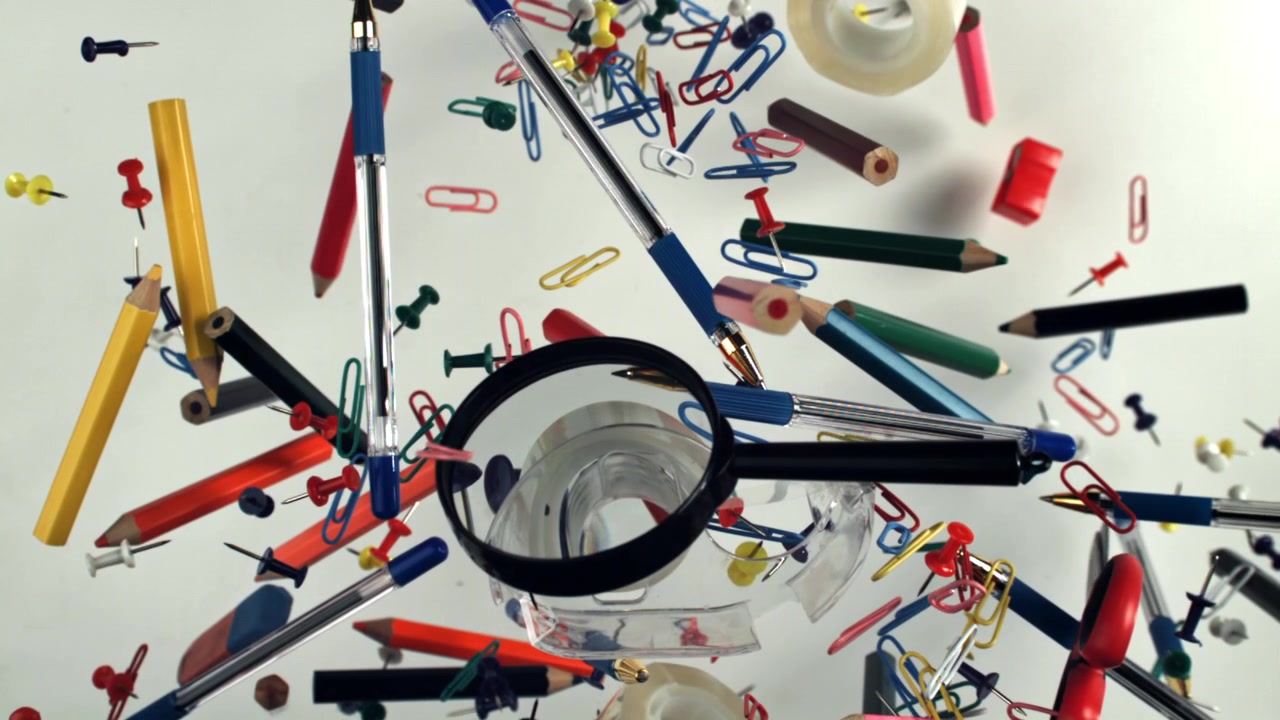 Colorful Office and School Supplies Floating in Slow Motion
