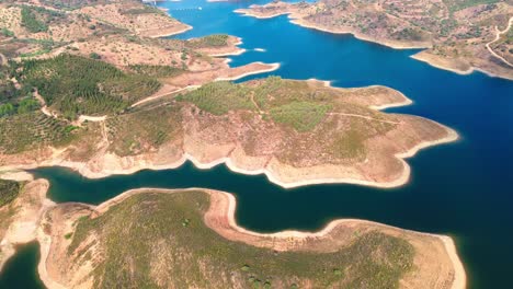 aerial-view-of-blue-dragon-river,-portugal,-4k