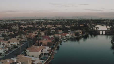 Aerial-drone-flight-over-Las-Vegas-suburb-on-lake