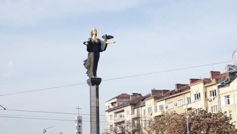 Low-angle-shot-of-Santa-Sofia-statue-in-the-city-center-in-Sofia,-Bulgaria-on-a-sunny-day