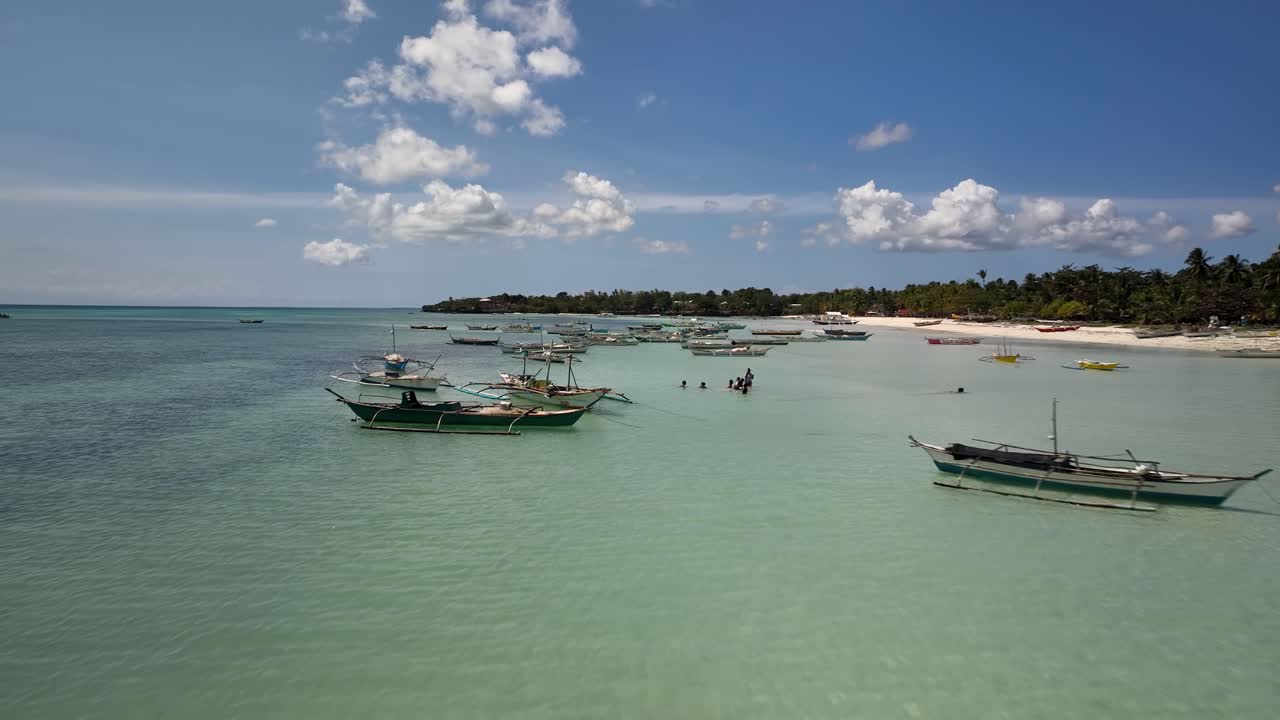 Beautiful Tropical Beach with Numerous Boats