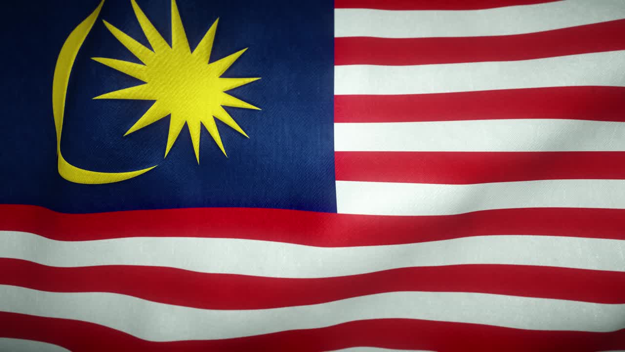 bandiera della malesia sventolata nel vento