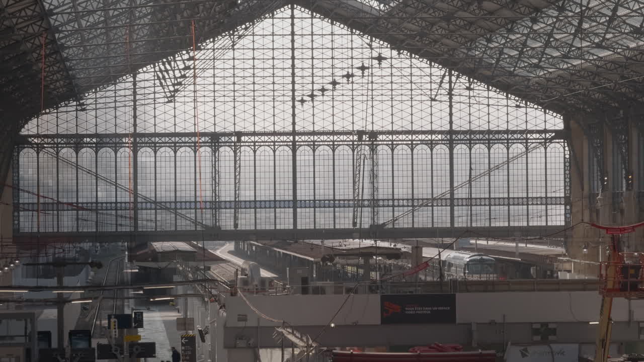 Restoration of Paris Austerlitz station with grand glass roof and empty platforms