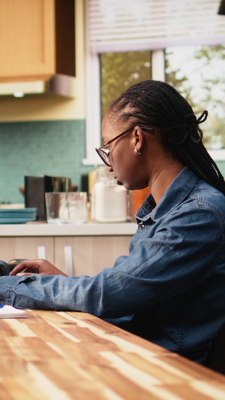 Vertical Video Woman focused on programming and software development tasks