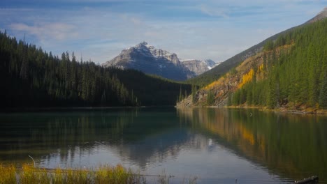 Woman-taking-last-look-at-postcard-natural-landscape-in-Canadian-Rockies