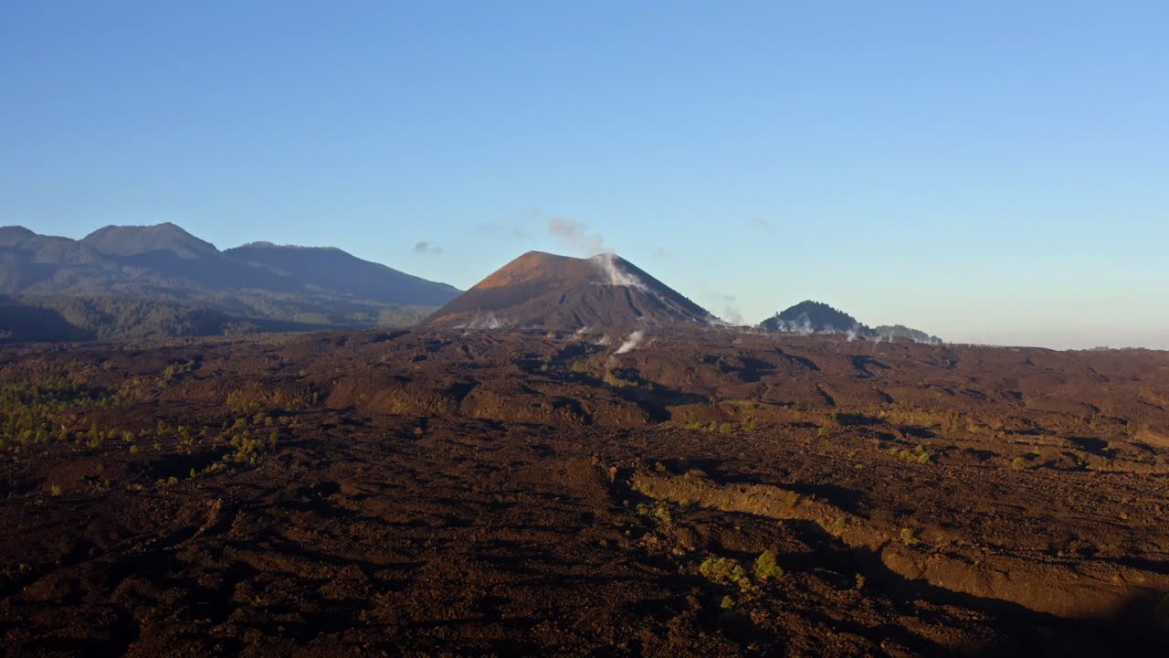 DRONE: BEAUTIFUL DOLLY OUT SHOT OF PARICUTIN VOLCANO WITH THE FIRST RAYS OF THE SUN