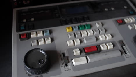 A retro broadcast video editing console controller