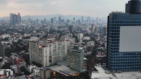 aerial view of mexico city skyline at dusk
