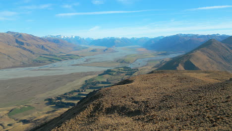 mountain ridge and rivers with farm land below in canterbury new zealand south island