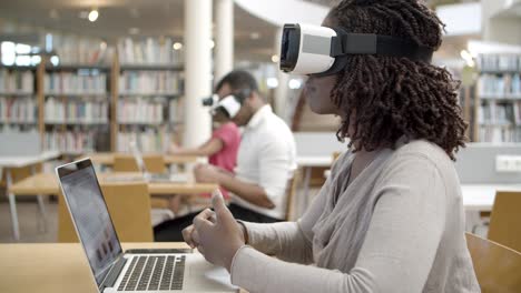 side view of woman wearing virtual reality glasses