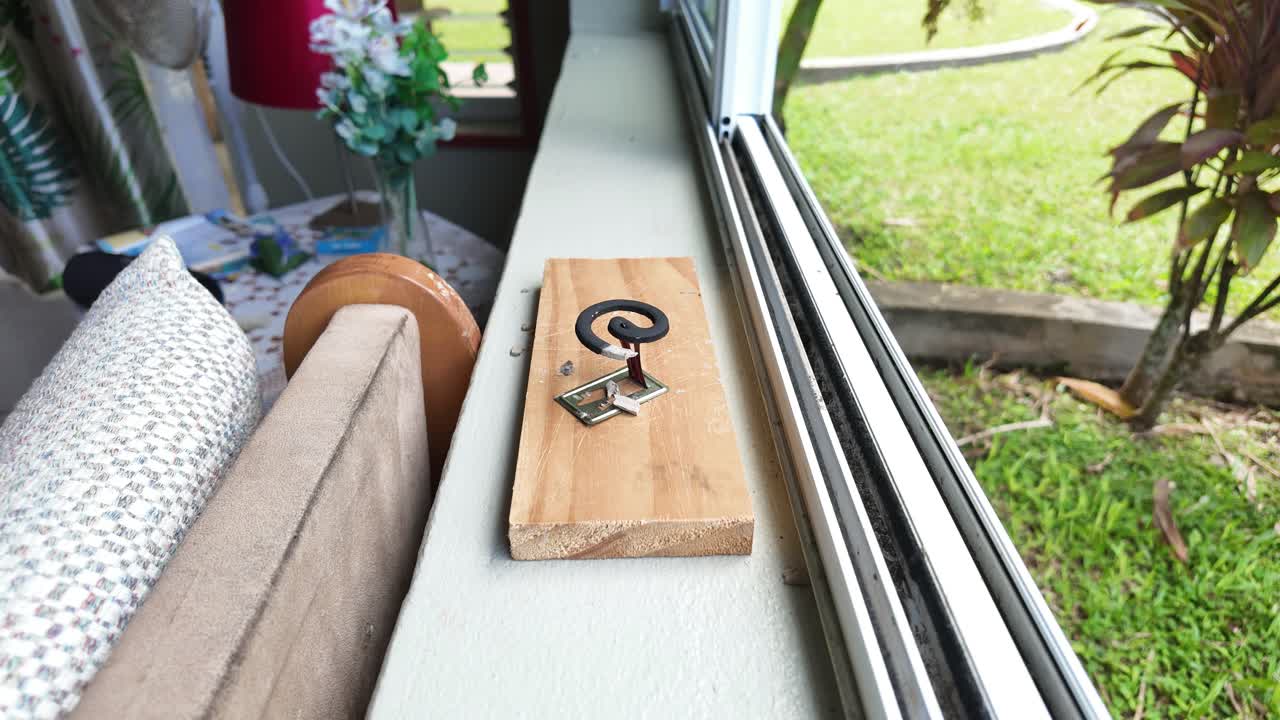 A wooden surface with a small circular mosquito repellant candle, Timelapse