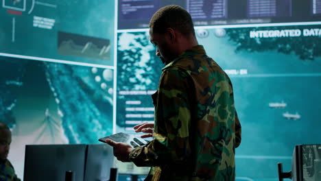 Cybersecurity-specialist-operates-in-a-high-tech-military-control-center