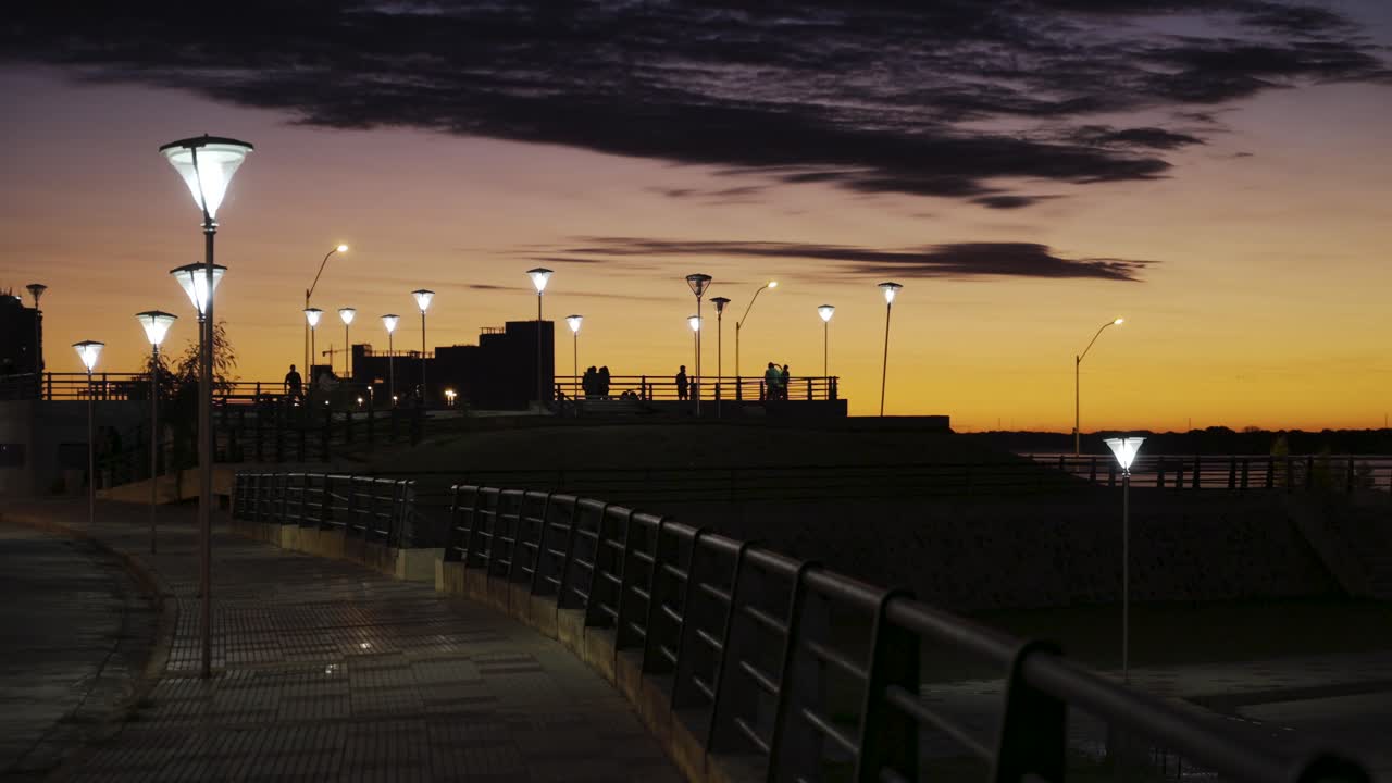 Sunset over the River: A Peaceful Evening Stroll