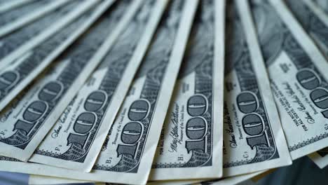 fan of hundred dollar bills
