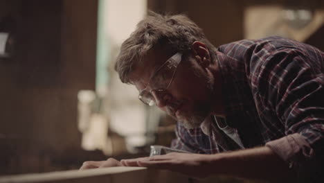 Man woodworking in his workshop