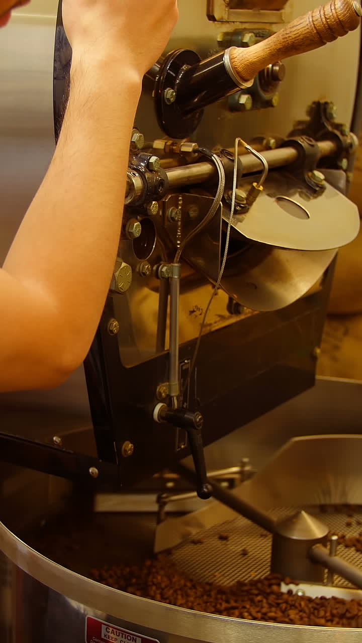 Man using coffee grinding machine