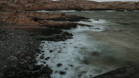 time lapse video of waves crashing on the coast in faerder national park in norway