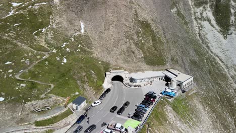 Early-morning-flight-above-popular-Grossglockner-alpine-road-in-High-Tauern-mountain-range-in-the-Alps,-Austria