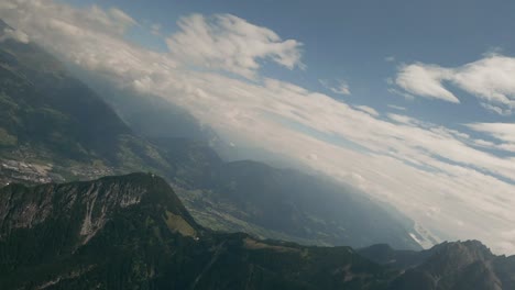 gopro camera footage from fpv racing drone flying down a mountain in austria during summer