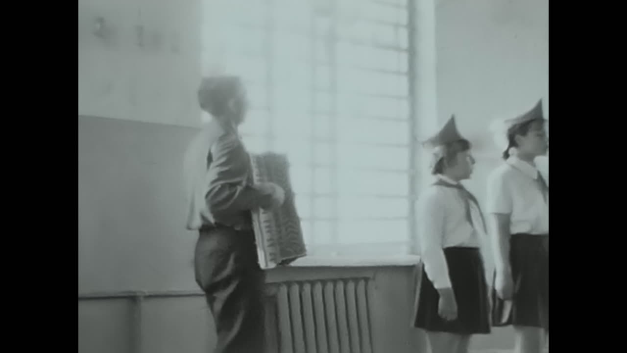 A group of pioneers at a meeting at school. CIRCA USSR 1970: A group of pioneers at a meeting at school