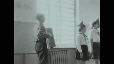a group of pioneers at a meeting at school. circa ussr 1970: a group of pioneers at a meeting at school