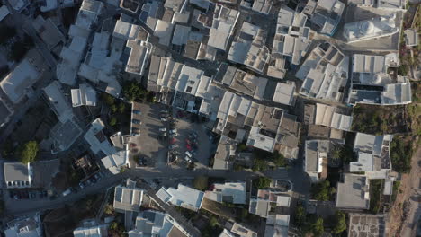 Overhead-Top-Down-Birds-View-Aerial-of-small-Town-on-Island