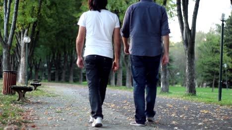 young men walking forest in leisure