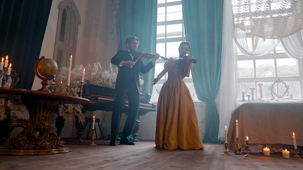 Elegant Man and Woman Playing Violins in a Candlelit Vintage Room