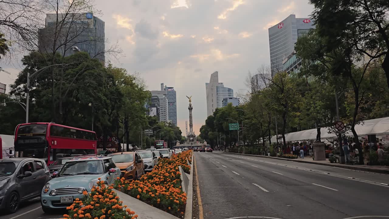 Walking down Reforma Avenue, a carpet of marigolds guides your way