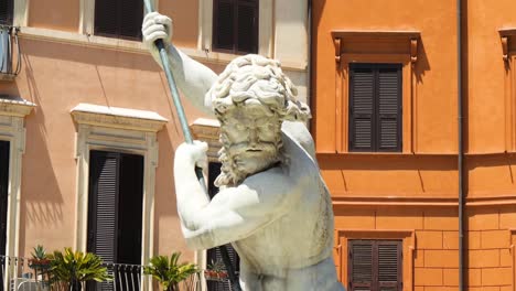 close up of the statue of neptune, fountain of the neptune in piazza navona, by giacomo della porta, rome, italy