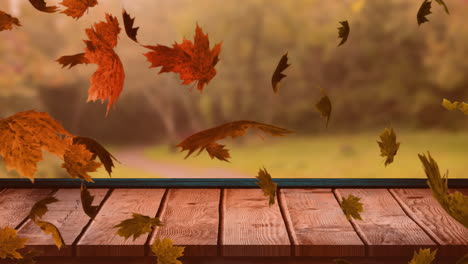 Animation-of-autumn-leaves-falling-over-trees-and-wooden-surface