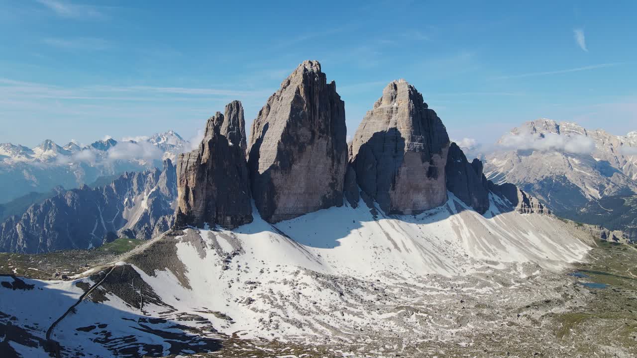 Tre Cime di Lavaredo, iconic Dolomite, alpine panorama, Clear Blue Sky, drone