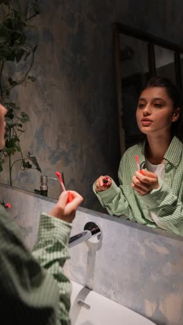 woman getting ready in bathroom