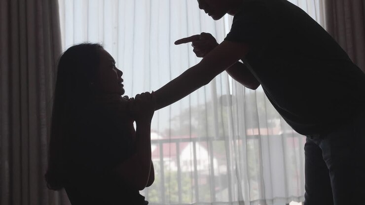 Silhouette Of Young Boyfriend Using Violence Against Girlfriend