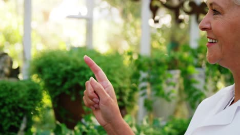 female scientist counting plants