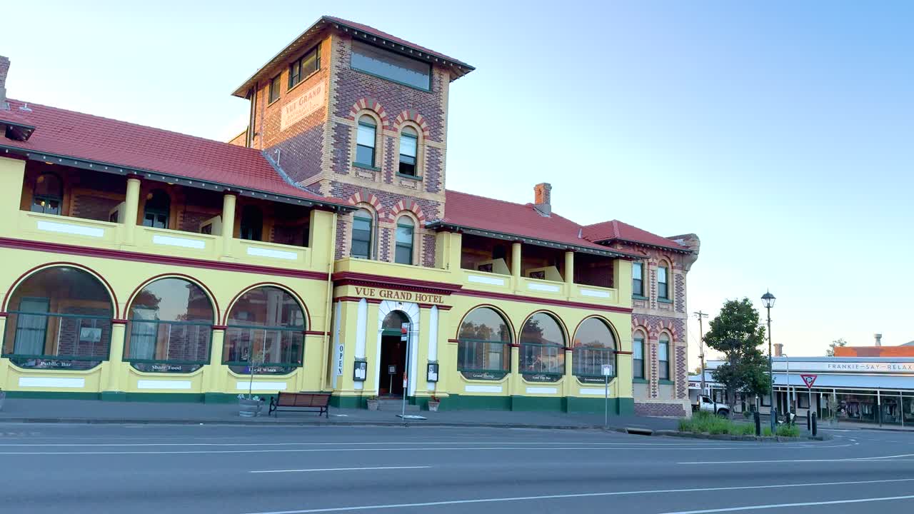 A panoramic view of the Vue Grand Hotel in Queenscliff, Victoria, captured during sunrise with clear skies