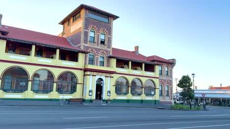 a panoramic view of the vue grand hotel in queenscliff, victoria, captured during sunrise with clear skies