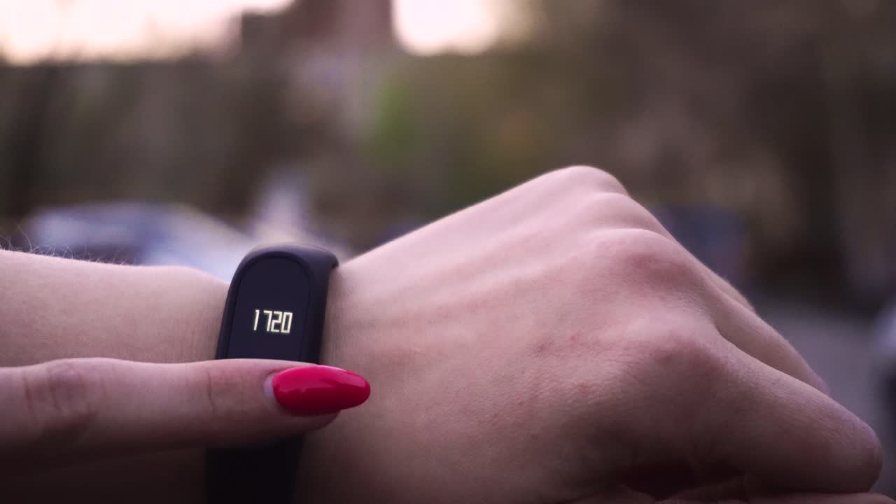 Woman wearing a fitness tracker