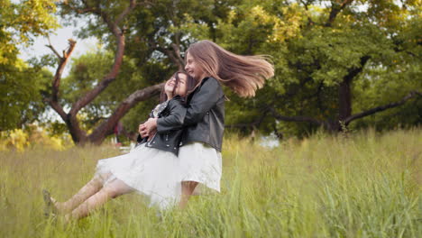 sisters playing in a meadow