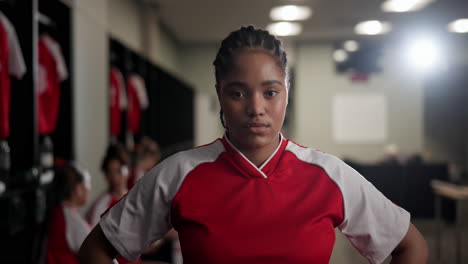 female soccer player in locker room