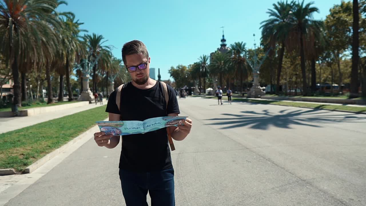 Tourist Reading a Map in a City Park