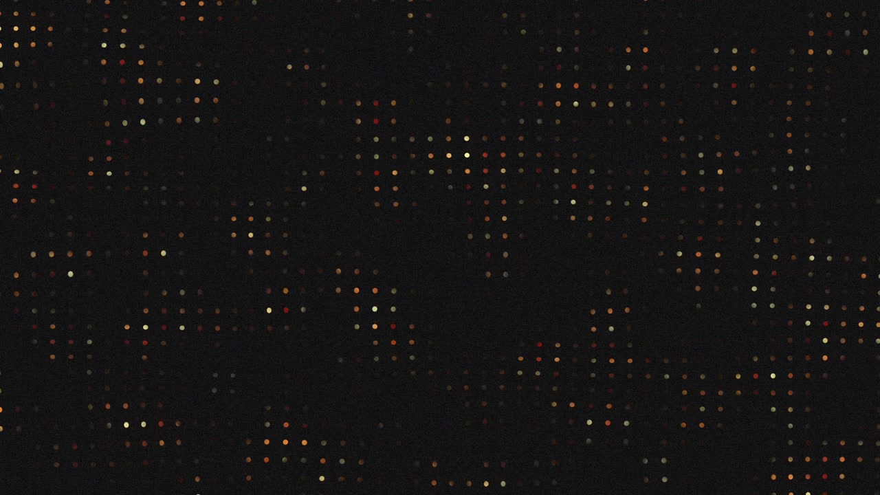 Abstract, colorful dots shimmer against a dark backdrop. Dynamic and mesmerizing, ideal for creative projects