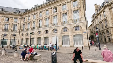 people enjoying a historic square in bordeaux