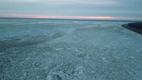 vast frigid landscape during sunset on remote area during winter