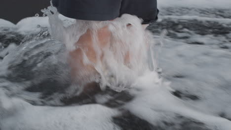 baby feet and ocean waves