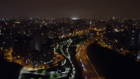 Drone-night-time-video-of-a-street-called-"Bajada-Armendariz"-Drone-hovers-and-turns-left-to-right